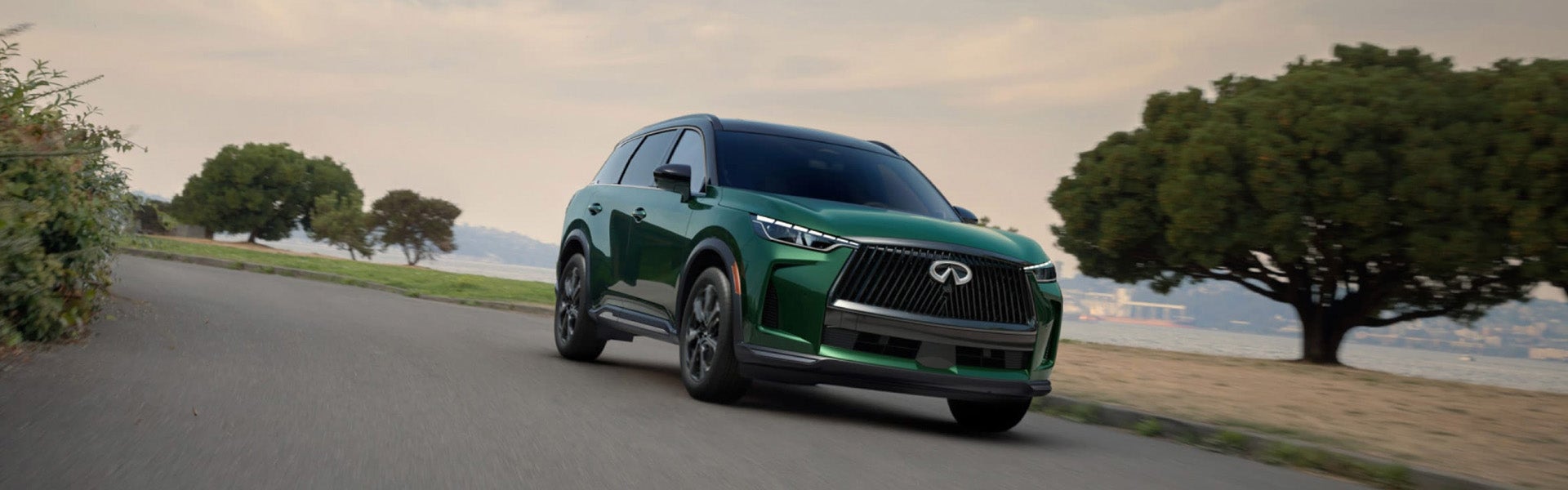 2026 QX60 driving on country road