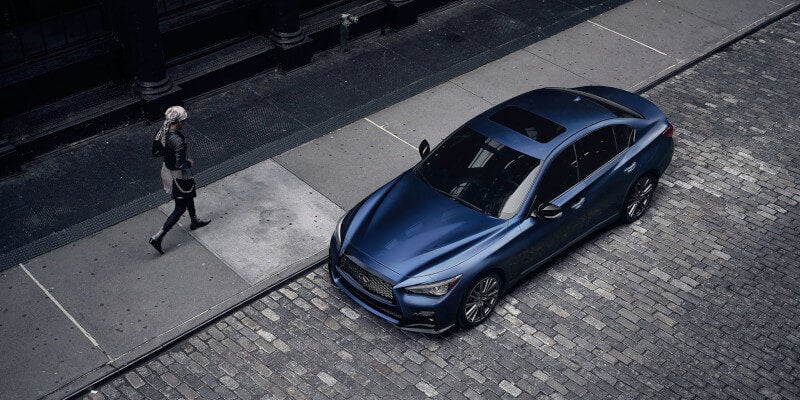 INFINITI parked on street